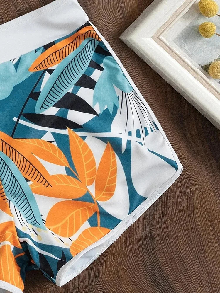 ExoticNeck™ | Bikini con scollo a V - Vita Alta e Spacco Laterale | Stampa Tropicale